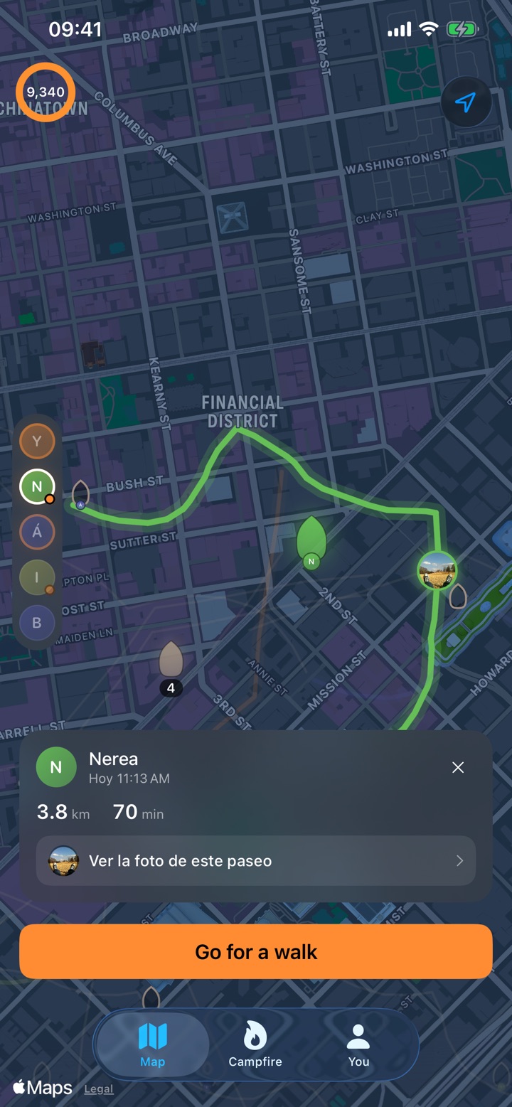 A walk opened on the Lume map: Nerea’s route highlighted in green, a photo of hers pinned to the point where she took it, and her walk card showing 2.4 miles and 70 minutes